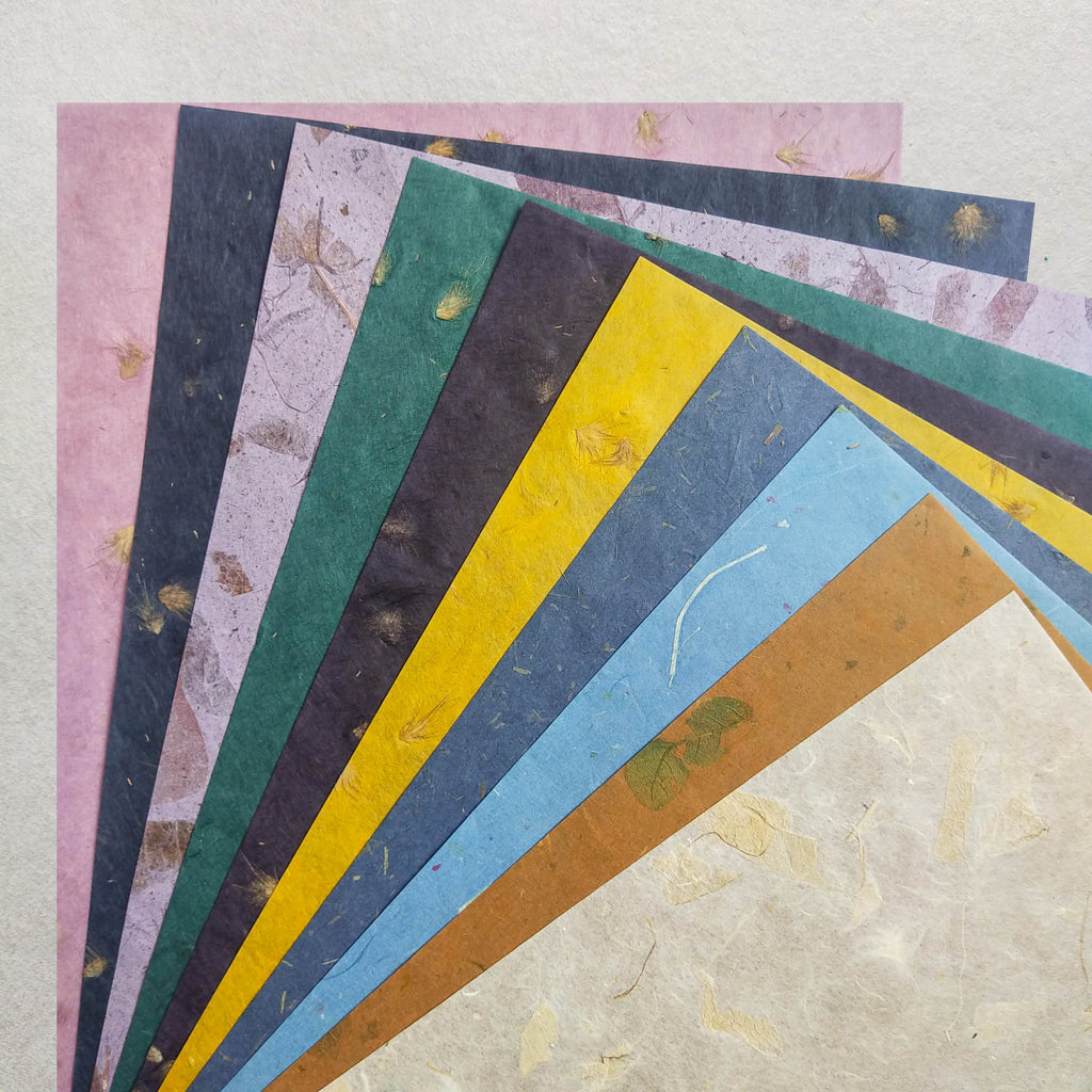 collection of dried leave decoupage rice paper from Kozo in blue, yellow, green, pink and gray