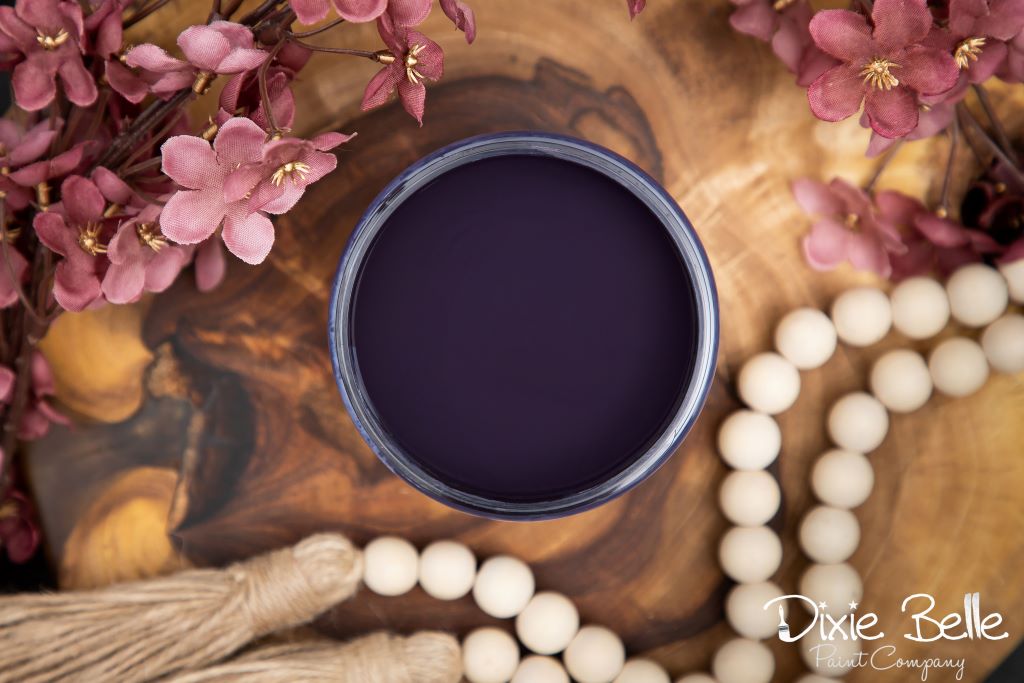 Jar of Dixie Belle chalk mineral paint in the color of  Aubergine Purple