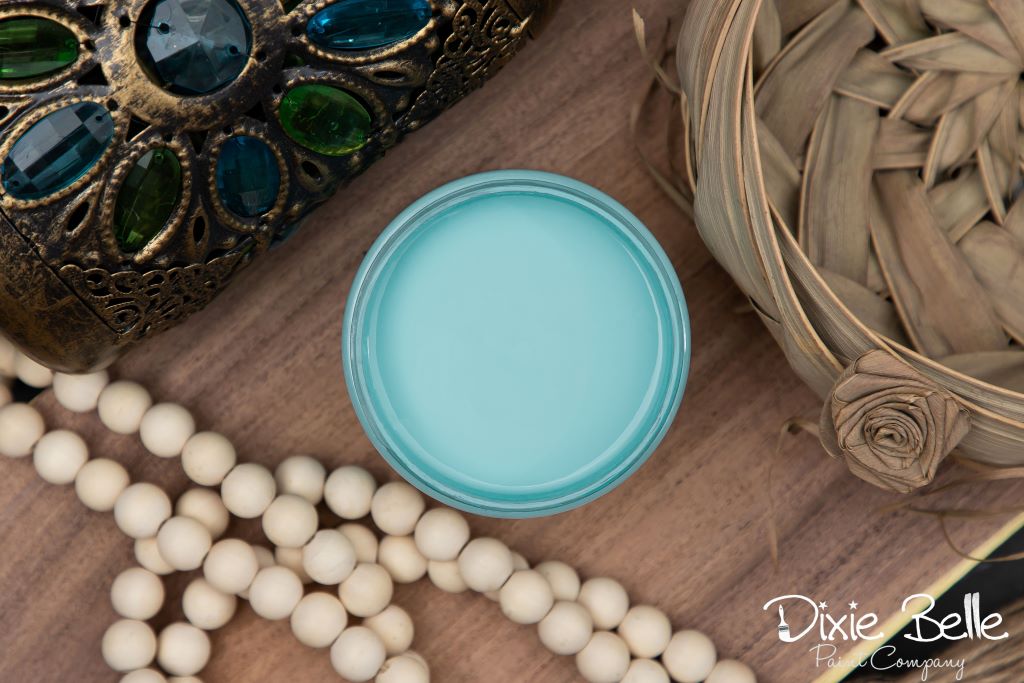 Jar of Dixie Belle chalk mineral paint in the color of Dixie Belle Blue