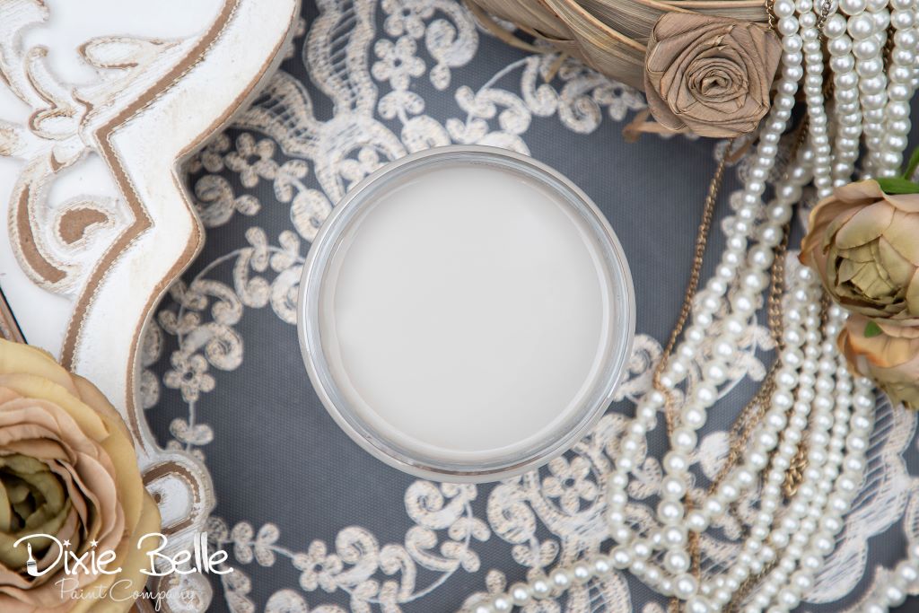 Jar of Dixie Belle chalk mineral paint in the color of  French Linen white