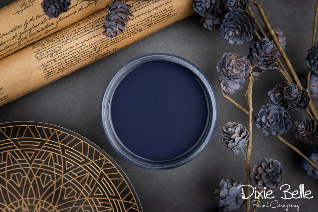 Jar of Dixie Belle chalk mineral paint in the color of In the Navy blue