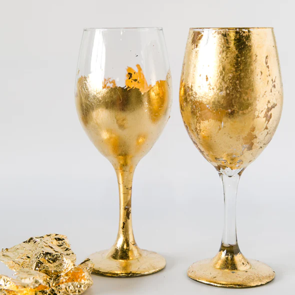 Two Wine glasses with Amy Howard at Home Gold Leaf shiny gold foil effects for furniture and home decor