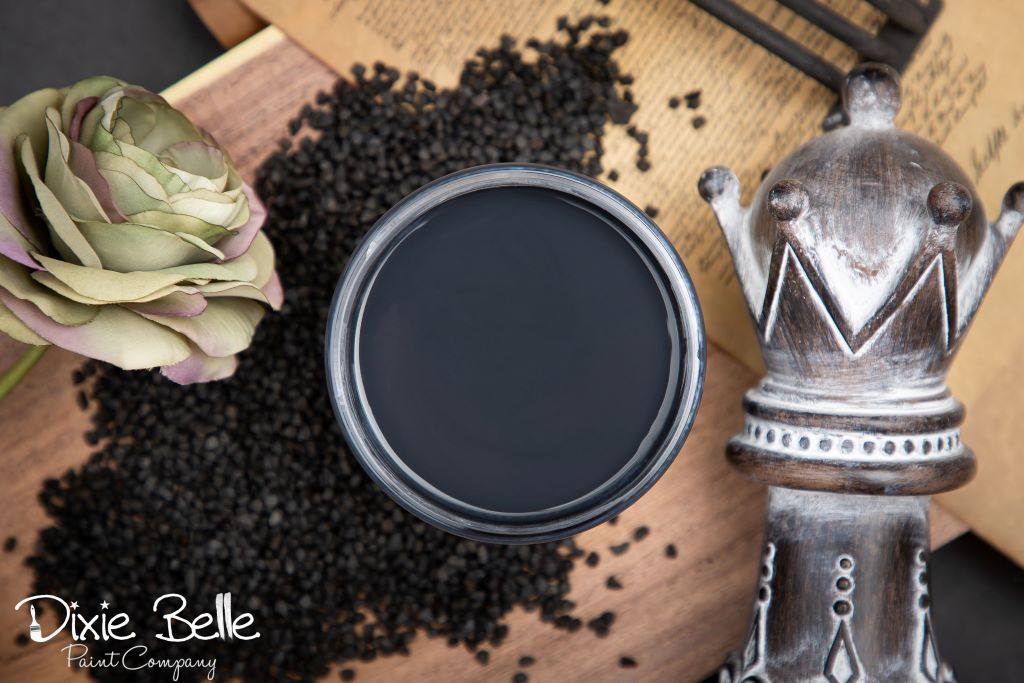 Jar of Dixie Belle chalk mineral paint in the color of Midnight Sky Black