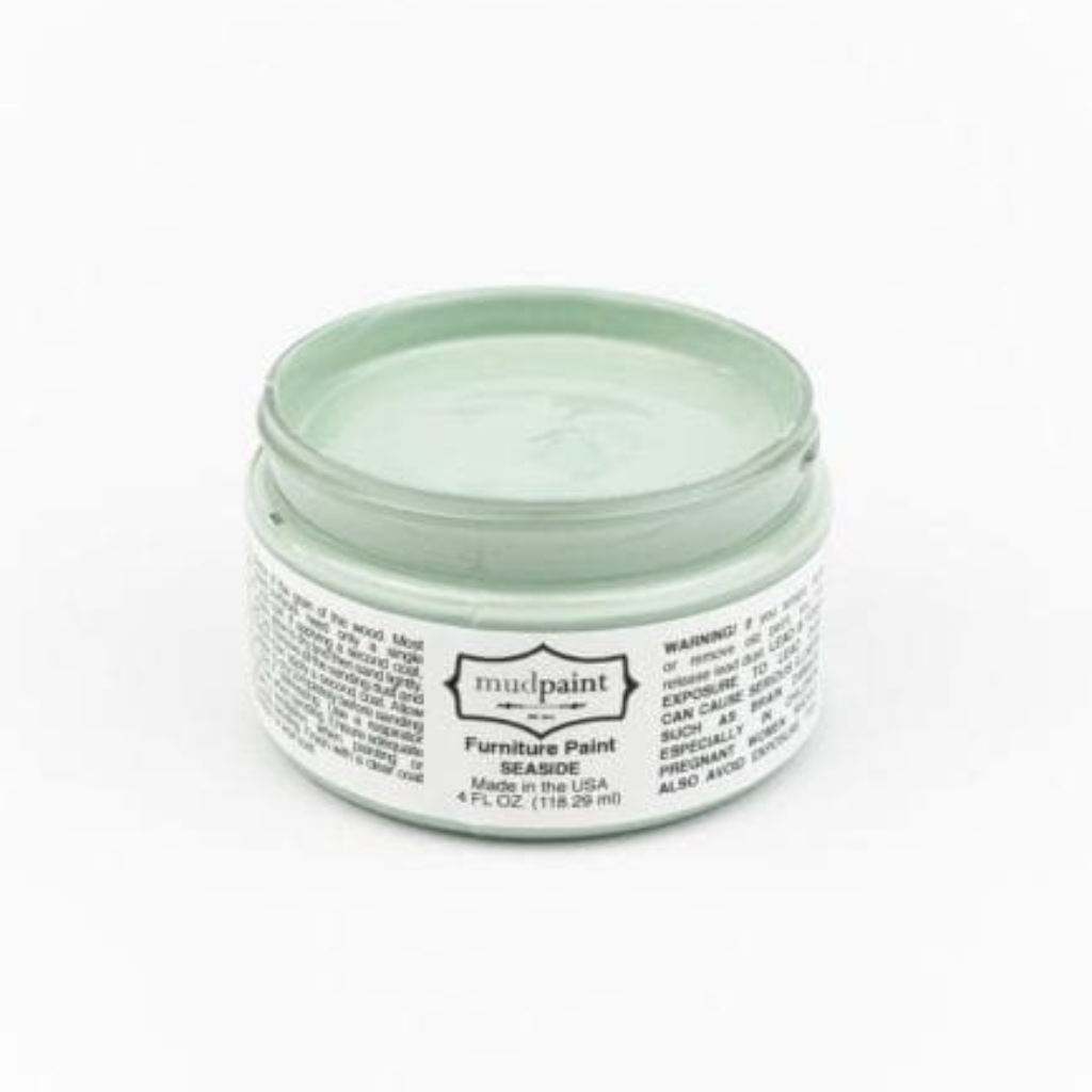 Light bright green Seaside Clay paint by Mudpaint. Colored paint in 4 oz jar