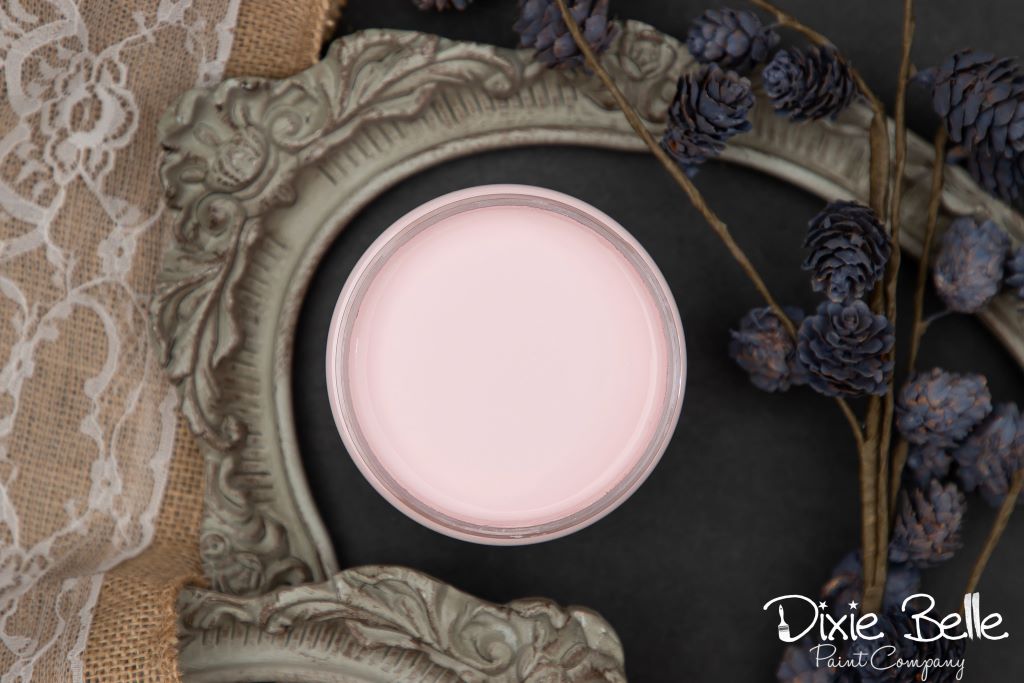 Jar of Dixie Belle chalk mineral paint in the color of soft pink