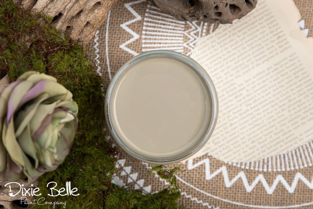 Jar of Dixie Belle chalk mineral paint in the color of Spanish Moss green
