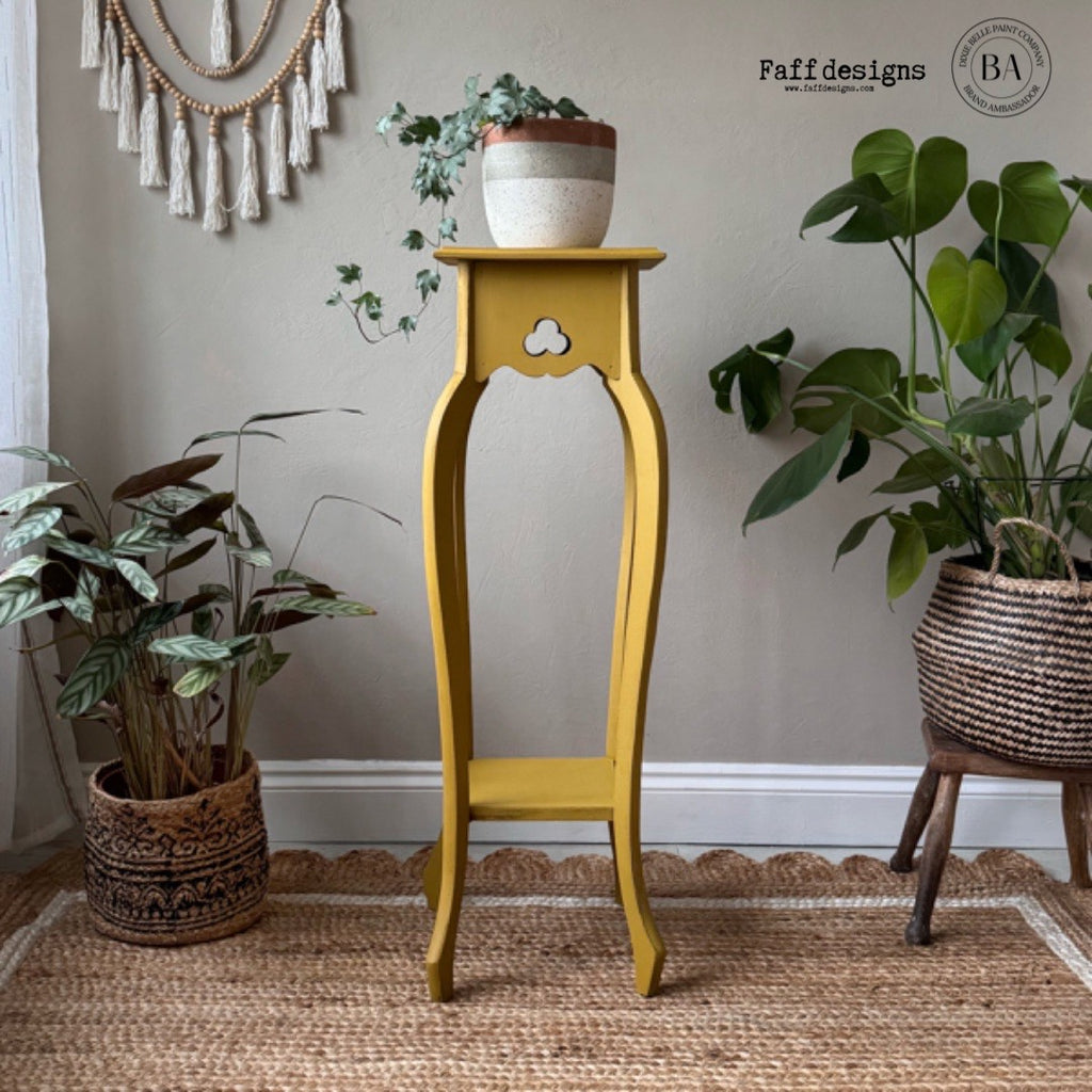 yellow stone color chalk paint from Dixie Belle on side table