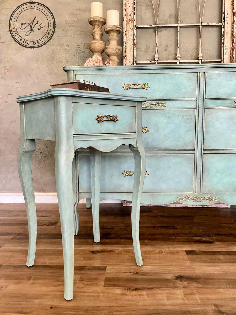 Light blue furniture coated in Dixie Belle Glaze in the color of  Pearlescent