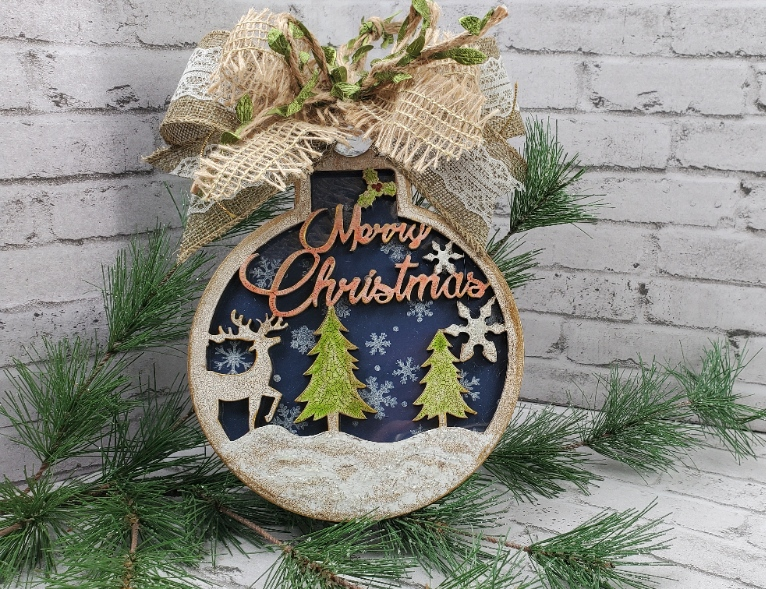 beautiful DIY Christmas ornament with white snow green trees and red Merry Christmas from DecouopagNapkins.com