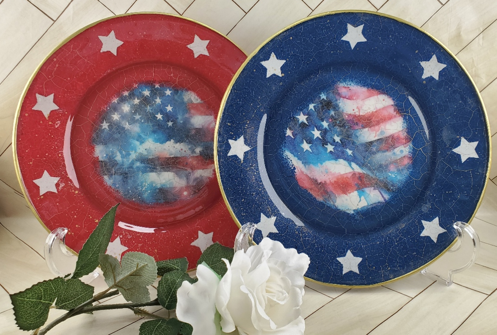 Red and blue 4th of july plates reversed decoupaged with an american flag pattern and gold gilded starts from DecoupageNapkins.com