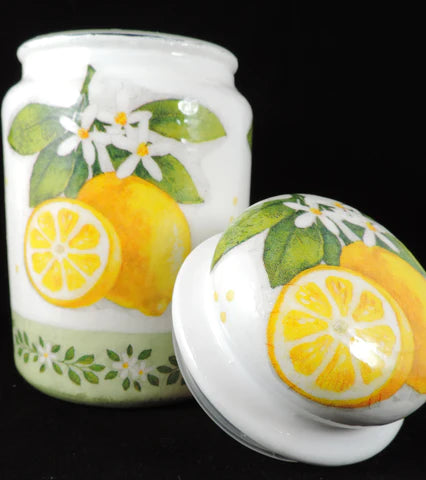 white painted Jar with Lemon napkins applied with decoupage paper napkins and mod podge.