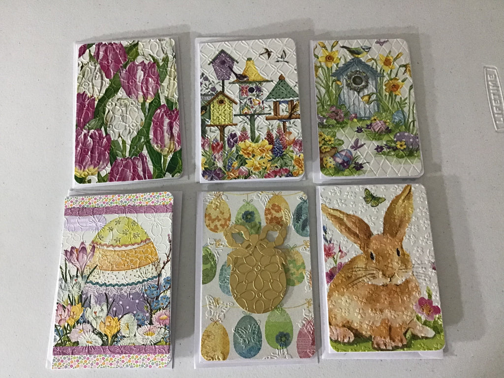 Bunnies and duck patterns in handmade greeting cards made with decoupage napkins.