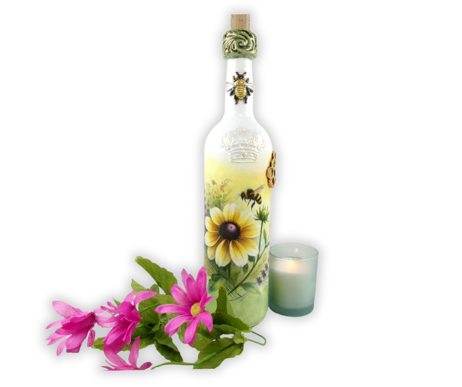 Wine bottle decoupaged with rice paper molds. Pattern is sunflowers and bees.