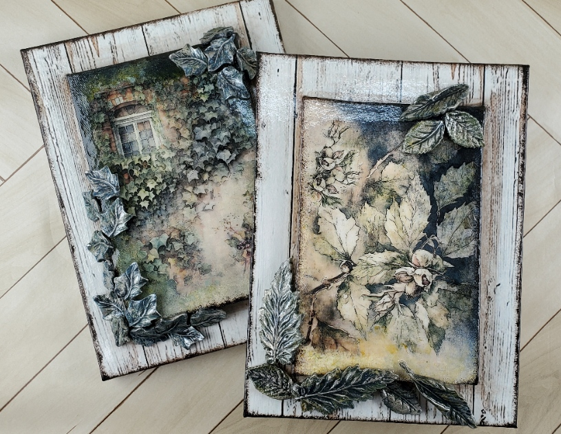 3d decoupage of flower rice papter with blue, tan and gray paint blended and decoupaged on canvas.