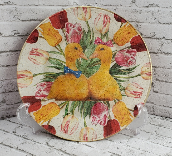 a glass plate that is reversed decoupage with 2 yellow ducks and beautiful pink and yellow tulips with green leaves from DecoupageNapkins.com