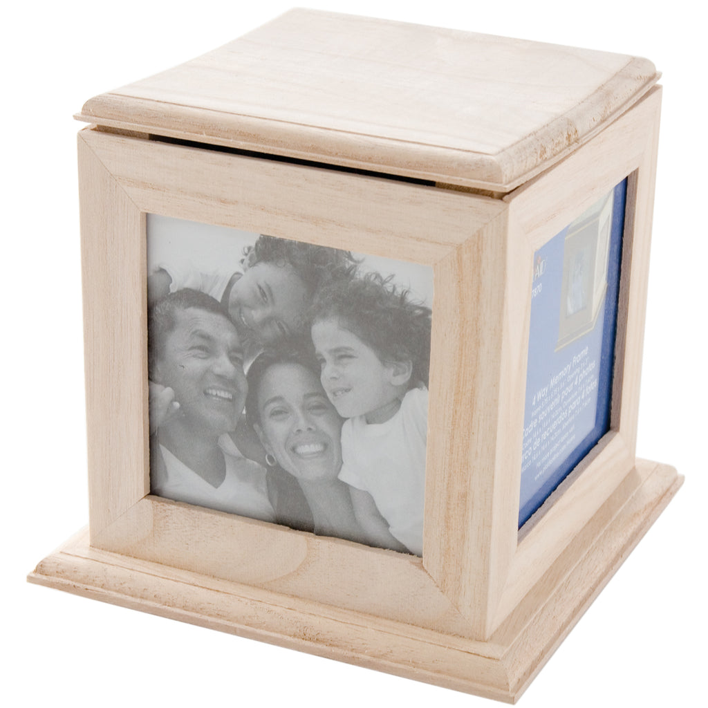 Wooden photo cube with family photo and text on a white background