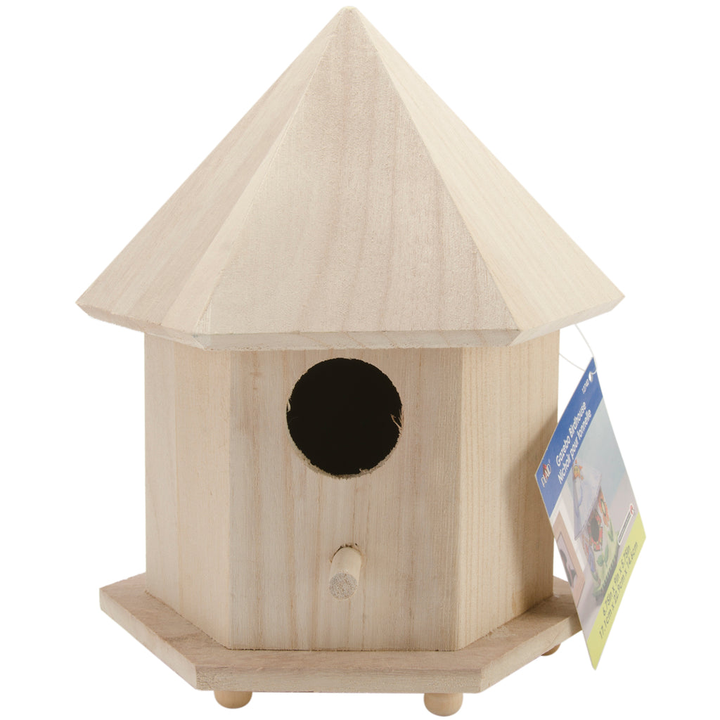 Wooden birdhouse with a pointed roof on a white background