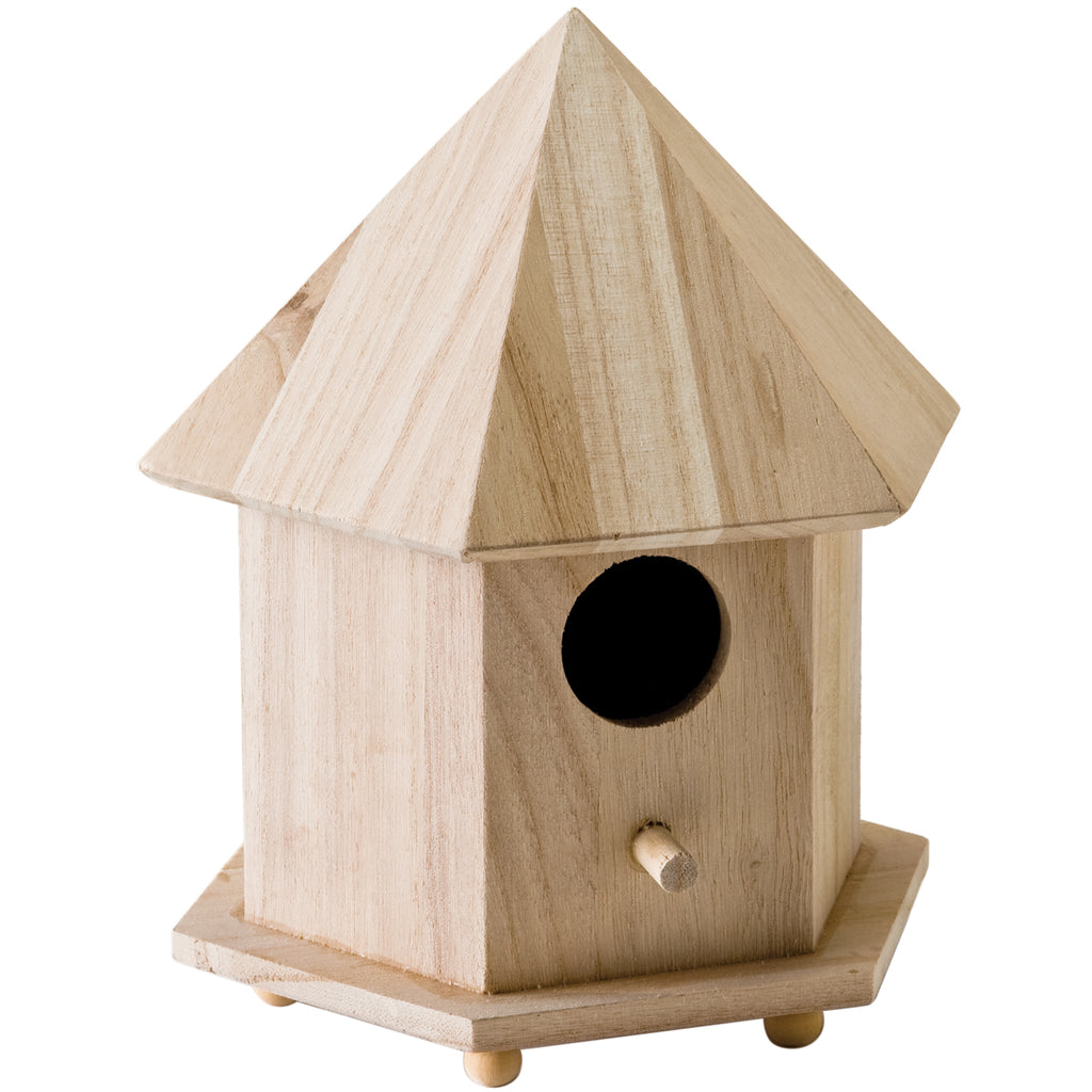 Wooden birdhouse with a pointed roof on a white background
