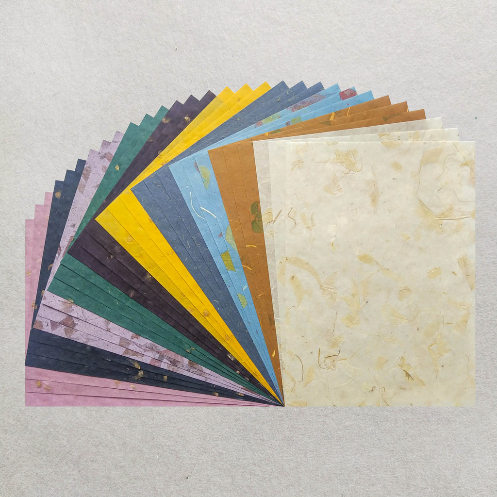 collection of dried leave decoupage rice paper from Kozo in blue, yellow, green, pink and gray