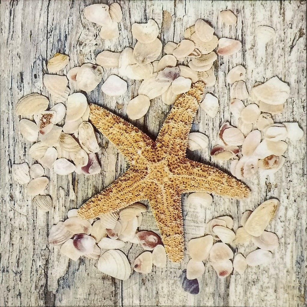Orange colored starfish on top of small seashells with wood background. Decorative paper napkin for Decoupage crafting.