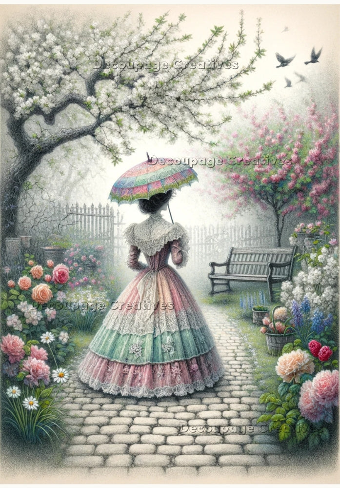 a victorian woman walking an a spring park with cherry blossoms with a pink and blue parasol decoupage paper by Decoupage Creatives