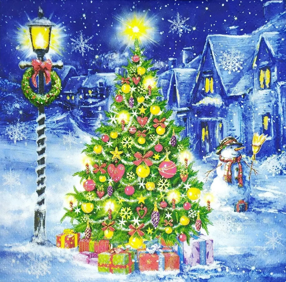 christmas tree next to lamp post and snowman at night in town Decoupage Napkins