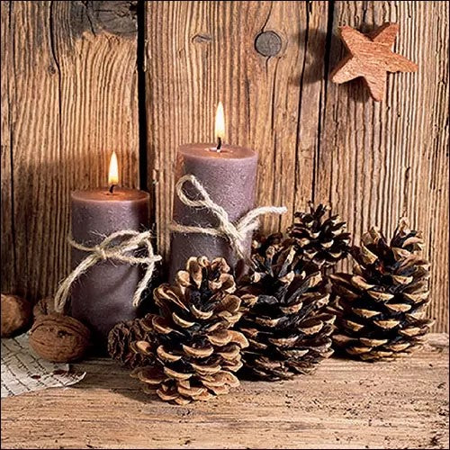 brown candles with pinecones on wood planking Decoupage Napkins