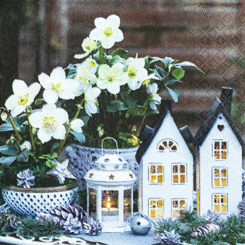 a candle setting of a lantern and toy house with white flowers in blue and white vases  Decoupage Napkins