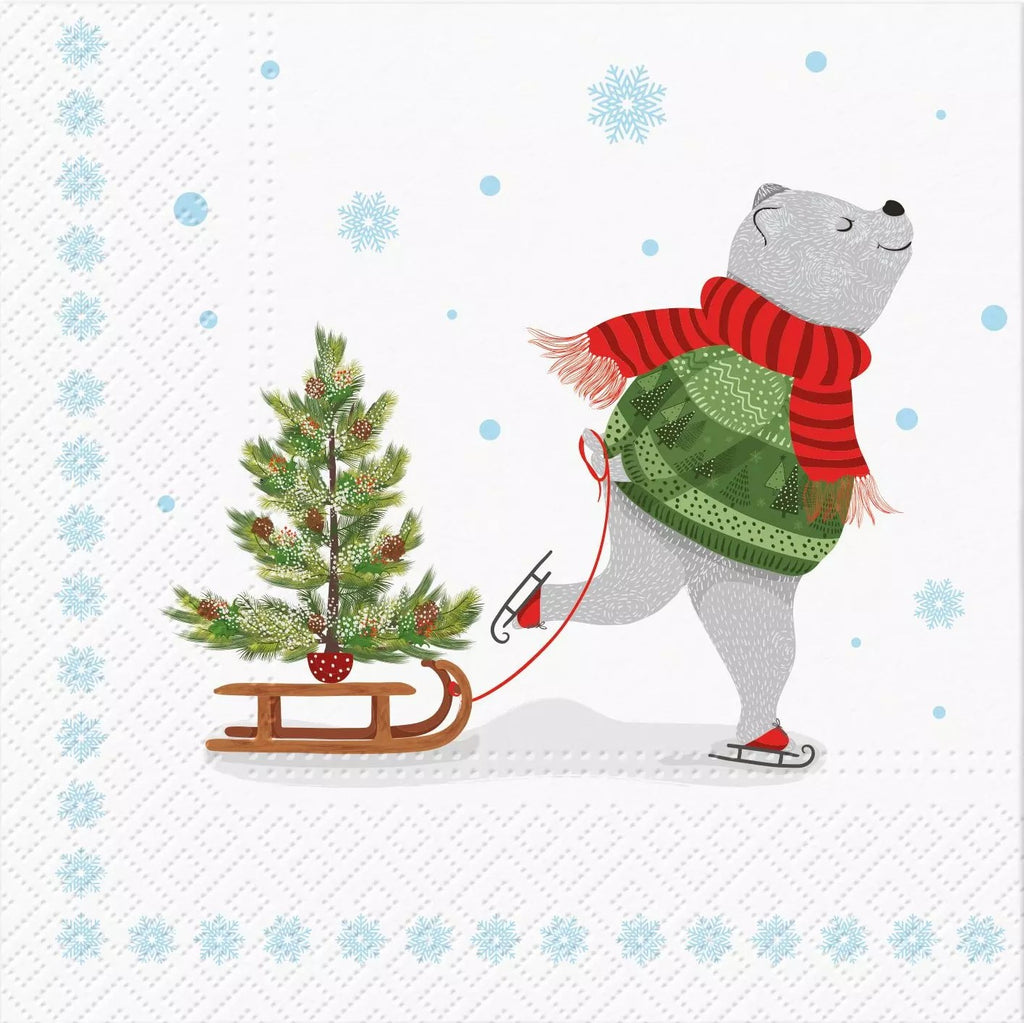 white polar bear in green sweater and red scarp ice skating pull a t brown sled with a christmas tree Decoupage Napkins