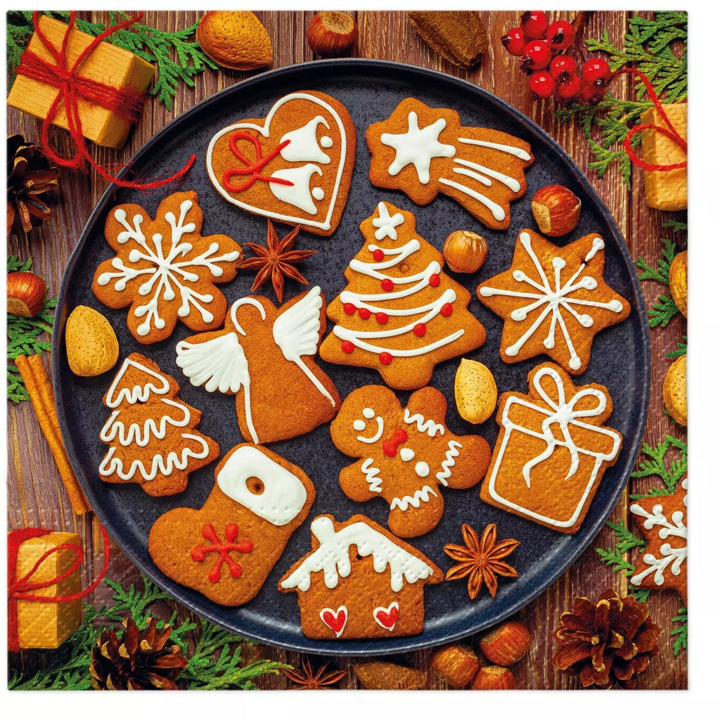 gingerbread cookies with white icing and on black tray