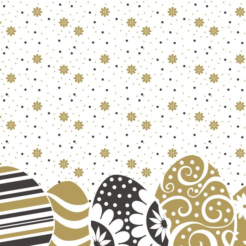 Gold and black Easter eggs on polka dot and flower background.