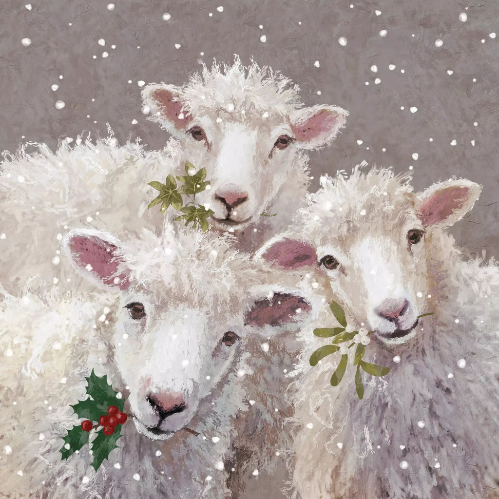 Three sheep with mistletoe in a snowy scene