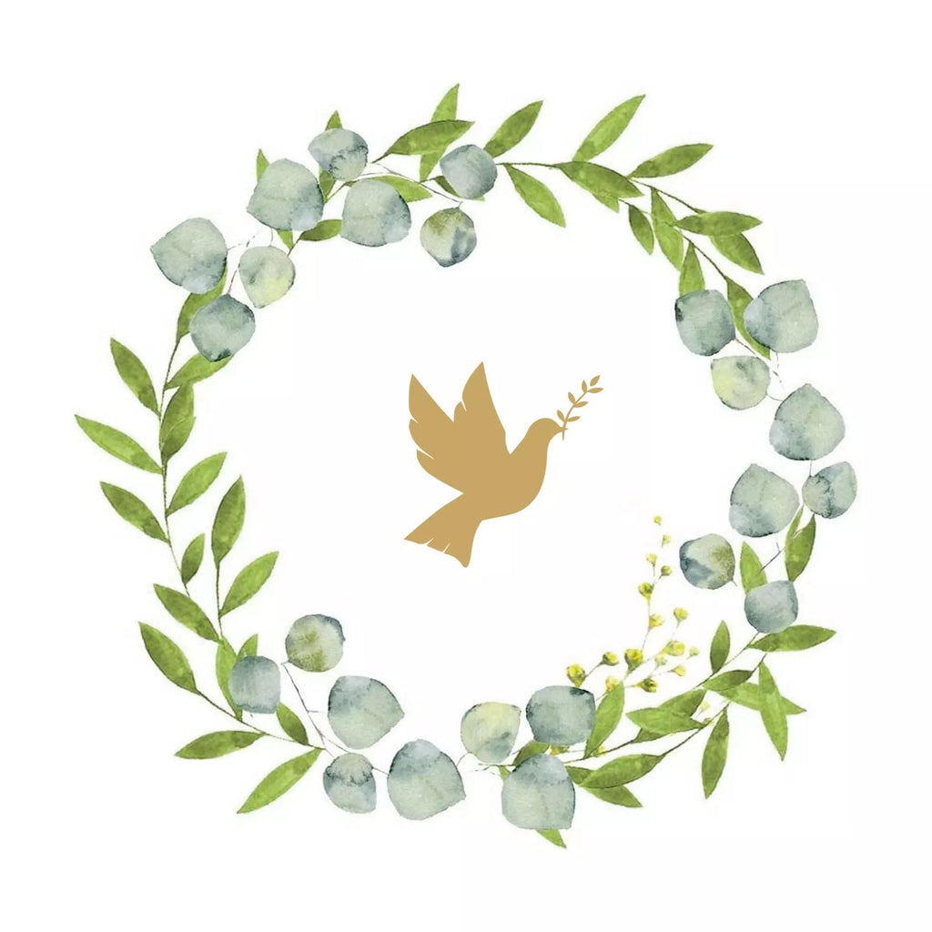 Gold dove inside wreath with greenery and leaves