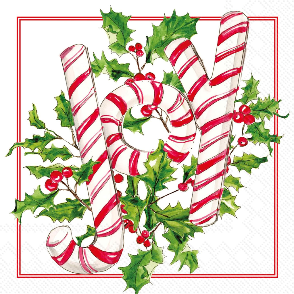 Candy canes on greenery spelling out the word JOY