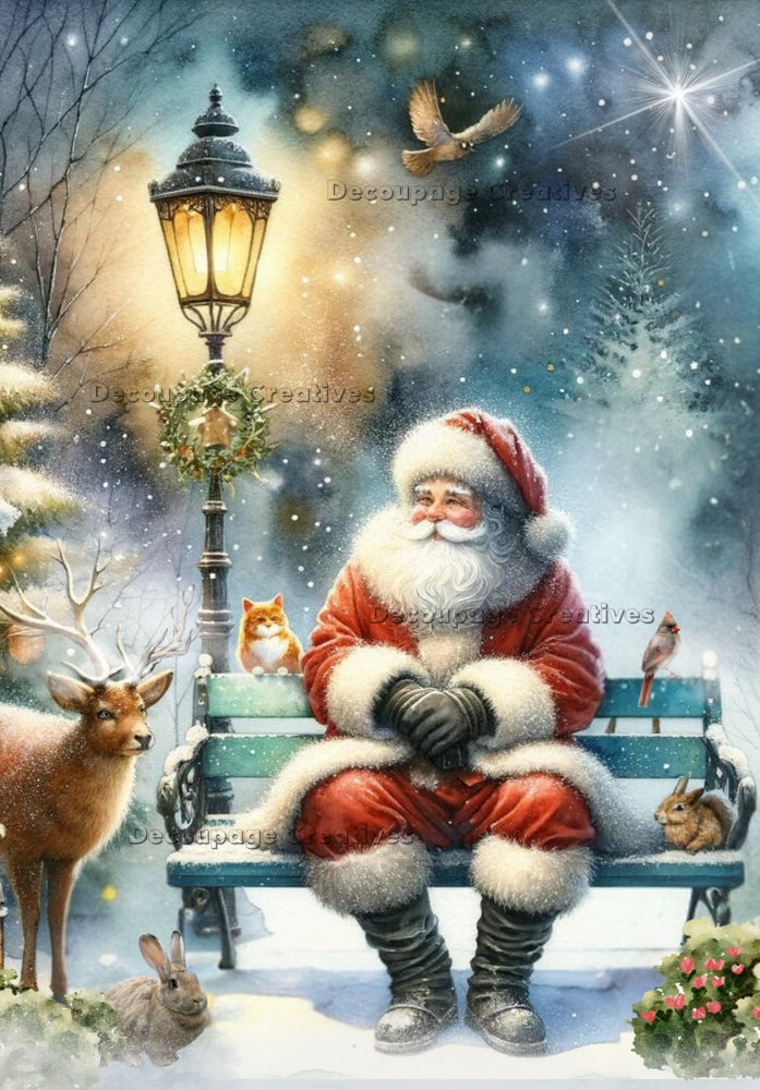 Vintage Santa on bench in snow next to street lamp with forest animals Decoupage Rice Paper from Decoupage Creatives