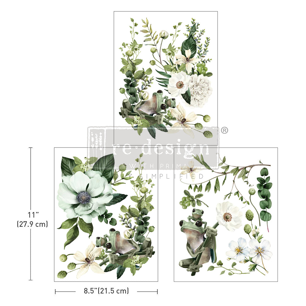 White and green floral rub on transfer by ReDesign with Prima. Small green frogs on flowers.