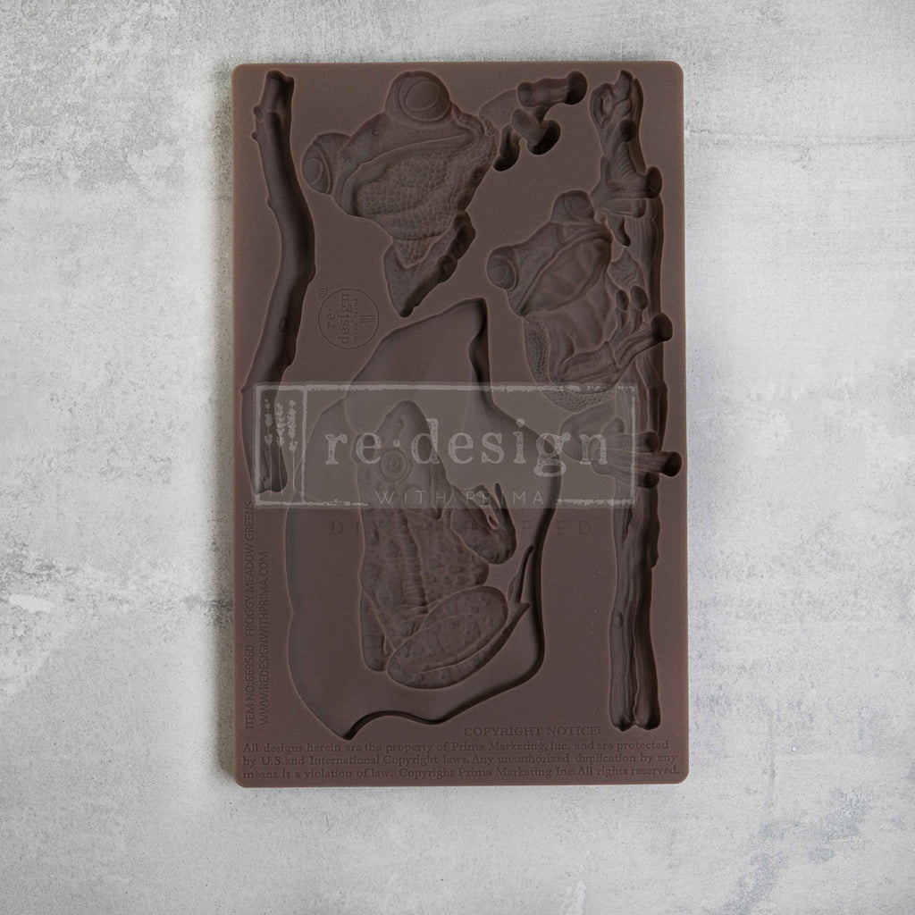 Brown silicone mold featuring frogs and sticks from ReDesign with Prima