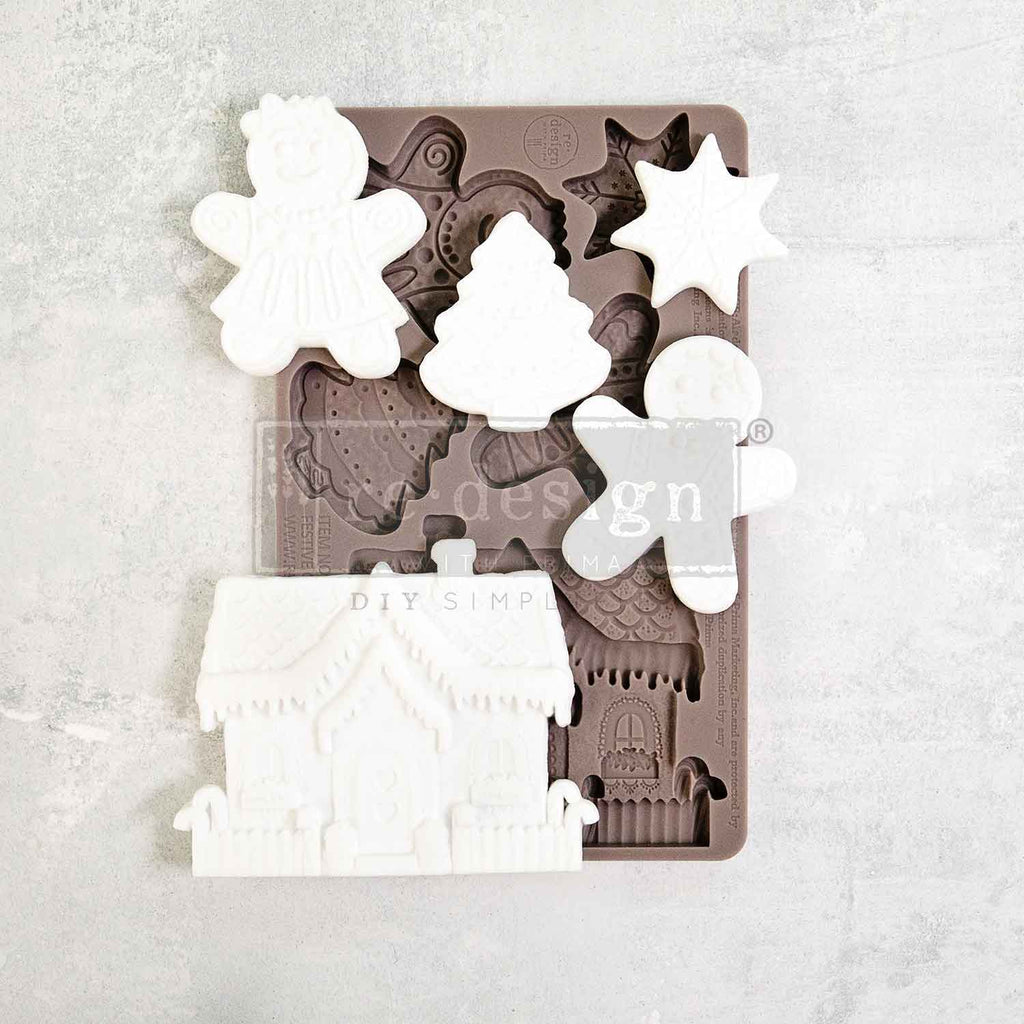 Redesign with Prima Festive Gingerbread Treats mold with 5 figures; star tree gingerbread dolls and house.