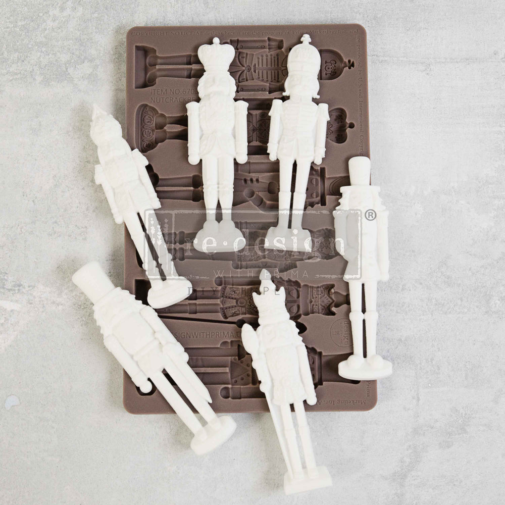 Brown silicone mold of 6 nutcrackers from Redesign with Prima