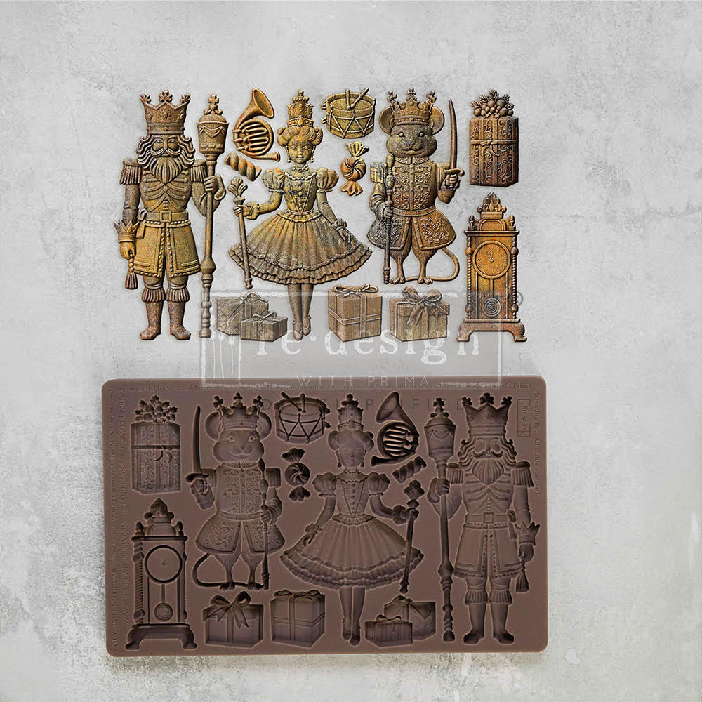 Brown silicone mold of nutcracker with ballet characters and presents from Redesign with Prima