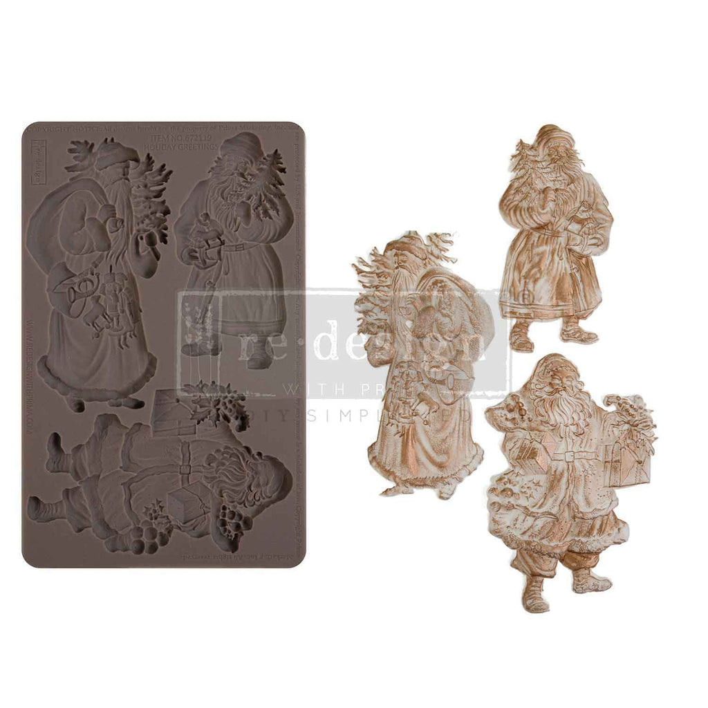 Redesign with Prima Holiday Greeting mold with 3 figures; Santas carrying greenery and presents