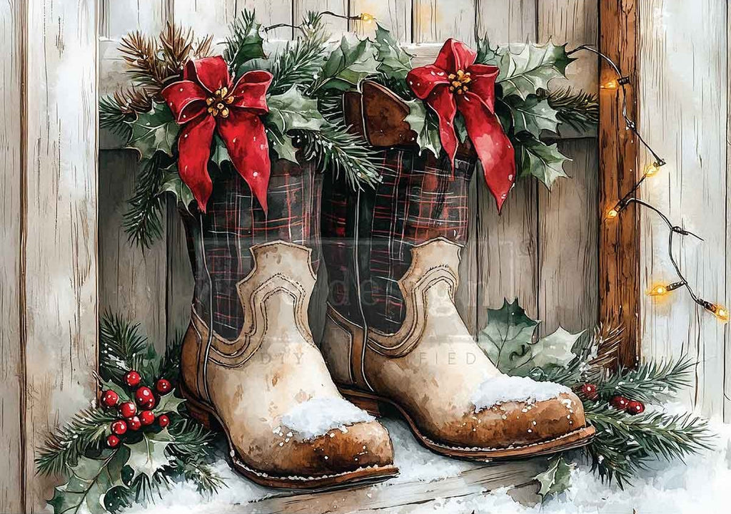Pair of plaid boots with red bows and Christmas decorations on a wooden background