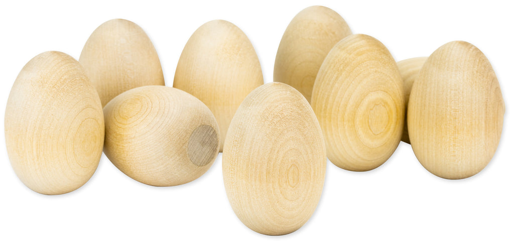 Set of wooden eggs on a white background