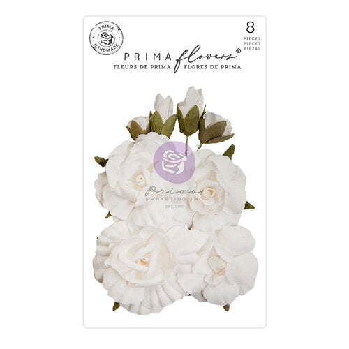 Cluster of white paper flowers and green leaves. Paper Flower Embellishments by Prima Marketing.