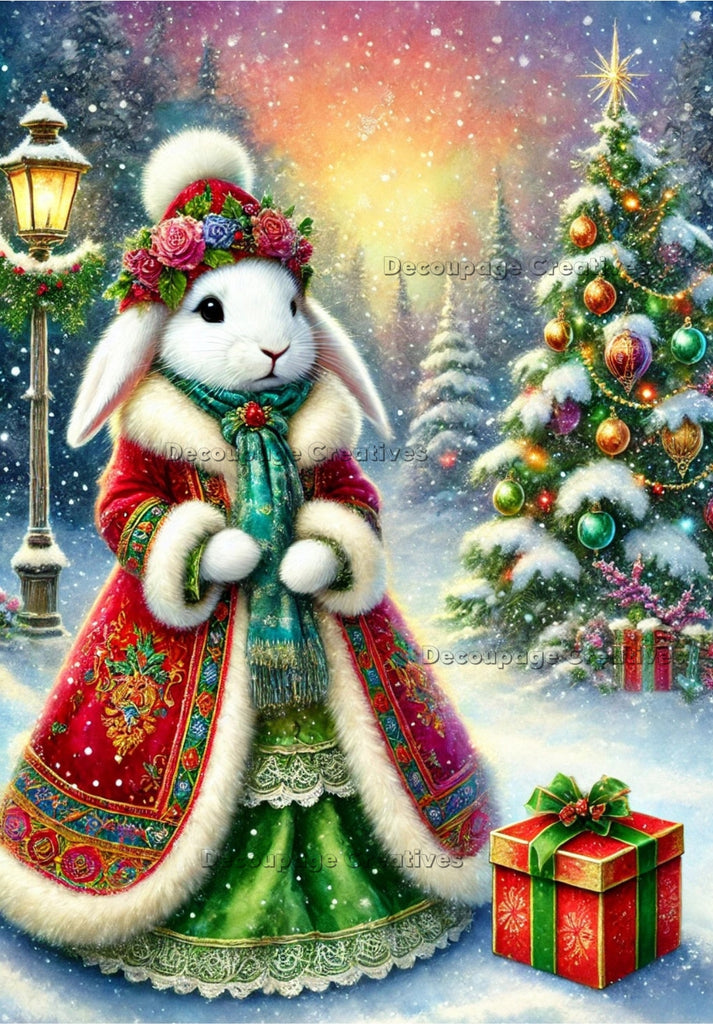 colorful dressed white bunny in christmas dress and flower Tiera with Christmas trees and a lamppost in the snow decoupage rice papers from decoupage creatives