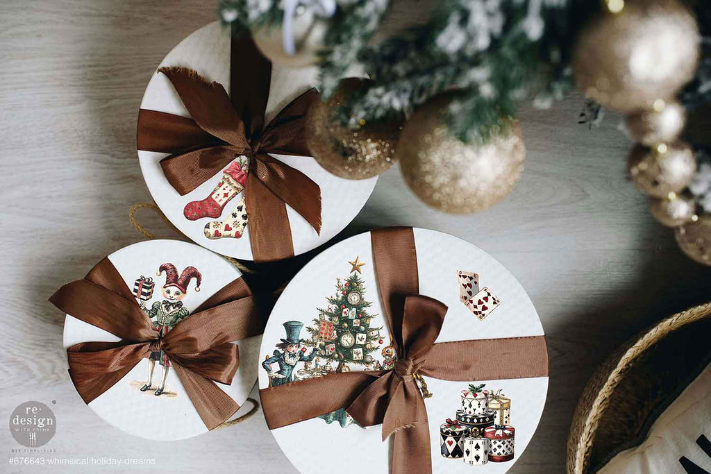 Whimsical Holiday Dreams rub on transfer by ReDesign with Prima. Alice in Wonderland Holiday theme with candy canes presents and stockings