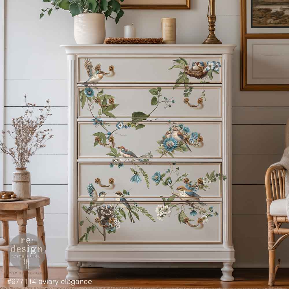 Aviary Elegance rub on transfer by ReDesign with Prima. Brown and blue bird with branches of blue and white flowers