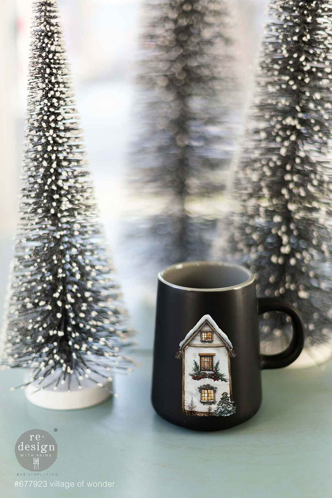 Village Of Wonder rub on transfer by ReDesign with Prima. Red and white houses in snowy village with evergreen and red bows