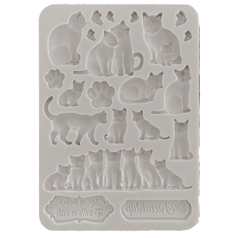 Multiple images of laying and sitting cats on grey Stamperia silicone mold.