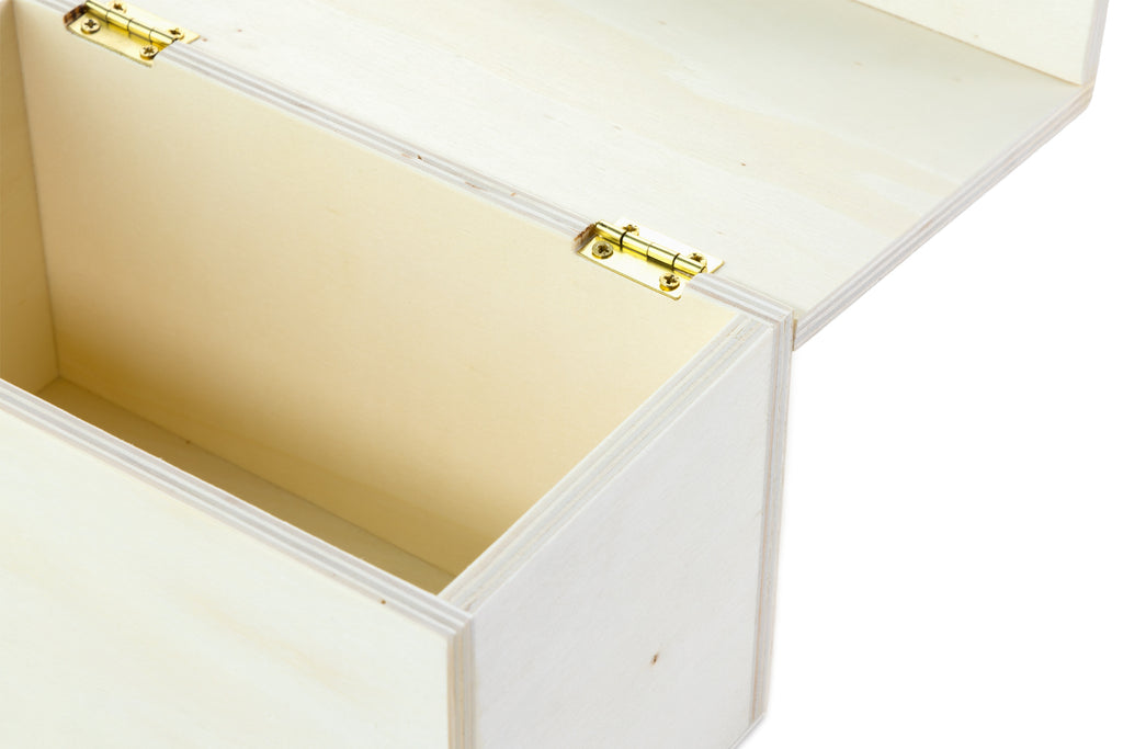 White wooden box with a gold latch on a white background